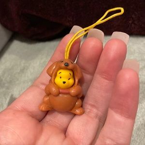 Brown puppy peek a pooh